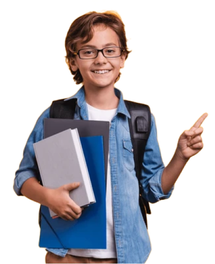 Young boy in a blue shirt holding a book and pointing to the title of the section.