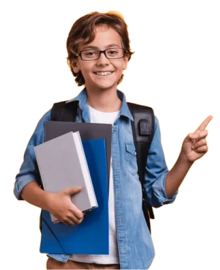 Young boy in a blue shirt holding a book and pointing to the title of the section.