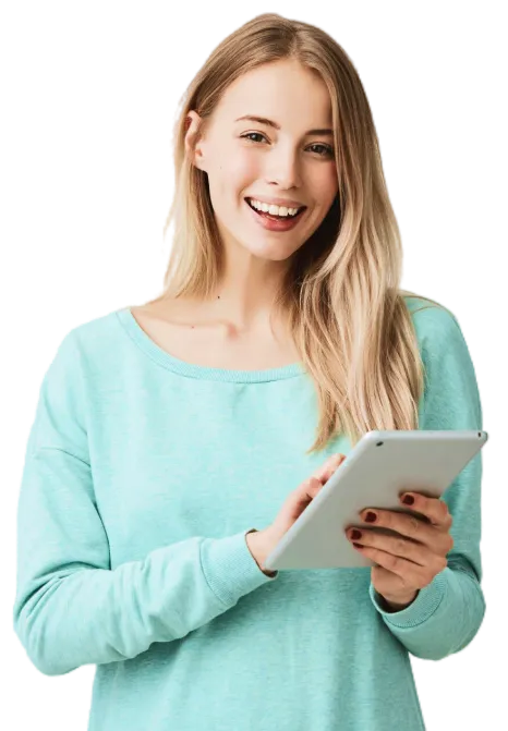 Smiling young woman in a light blue sweater holding a tablet.